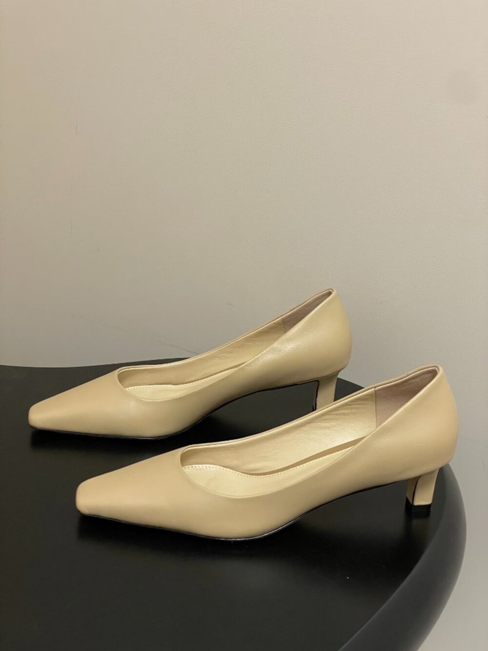 The Row Cream Leather Pumps